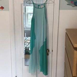 HD in Paris green and blue pleated dress